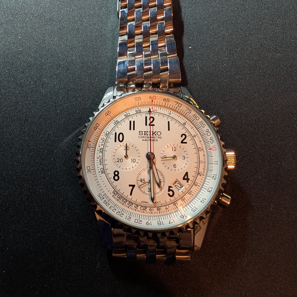 Seiko Silver and White Men's Navitimer Chronograph Bracelet Watch